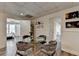 Inviting dining area featuring a glass table, stylish chairs, and doorway leading to other rooms creating an open layout at 4852 Jacobs Cove Pt, Buford, GA 30519
