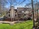Back exterior of the house and landscaped yard at 790 Denards Se Ml, Marietta, GA 30067