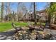 A lovely backyard featuring a fire pit and chairs for entertaining and outdoor enjoyment at 790 Denards Se Ml, Marietta, GA 30067