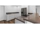 Kitchen features granite countertops, stainless steel appliances, and white cabinets at 790 Denards Se Ml, Marietta, GA 30067