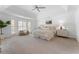 Spacious main bedroom featuring neutral decor, large windows, and a cozy sitting area at 790 Denards Se Ml, Marietta, GA 30067