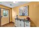 Inviting entryway with decorative glass door and stylish cabinet decor at 8698 Twin Oaks Dr, Jonesboro, GA 30236