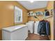 Laundry room with washer, dryer, and freezer at 8698 Twin Oaks Dr, Jonesboro, GA 30236