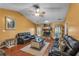Comfortable living room featuring hardwood flooring, a fireplace and ample seating at 8698 Twin Oaks Dr, Jonesboro, GA 30236