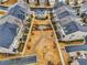 Aerial view of residential neighborhood with a central green space, walking paths, and seating at 1198 Olmsted Park Rd, Decatur, GA 30033