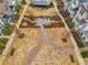 Overhead view of a manicured green space with benches, walkways, and seating areas at 1198 Olmsted Park Rd, Decatur, GA 30033