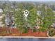 Aerial view of a residential home nestled among lush trees at 1198 Olmsted Park Rd, Decatur, GA 30033