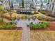 Inviting common area featuring Adirondack chairs and lush, colorful landscaping at 1198 Olmsted Park Rd, Decatur, GA 30033