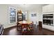 Cozy dining area with hardwood floors, round table, and built-in cabinetry at 1198 Olmsted Park Rd, Decatur, GA 30033