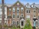 Charming brick townhome with manicured landscaping, covered entries, and a welcoming neighborhood appeal at 1198 Olmsted Park Rd, Decatur, GA 30033