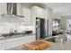 Beautiful kitchen featuring stainless appliances and subway tile backsplash at 1198 Olmsted Park Rd, Decatur, GA 30033