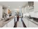 Modern kitchen boasts granite countertops and stainless steel appliances at 1198 Olmsted Park Rd, Decatur, GA 30033
