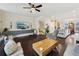 Open floor plan showcasing living area, kitchen, and staircase with hardwood floors at 1198 Olmsted Park Rd, Decatur, GA 30033