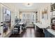 Bright office space featuring a glass door to a patio, hardwood floors, and built-in shelving at 1198 Olmsted Park Rd, Decatur, GA 30033