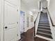 Hallway view with wood stairs and white trim at 1198 Olmsted Park Rd, Decatur, GA 30033