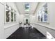 Bright interior space with white walls, many windows, and a dark floor. Great natural light! at 2820 Andrews Nw Dr, Atlanta, GA 30305