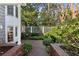 Lush landscaping with brick and hardscape creates a private and relaxing yard area, great for enjoying the outdoors at 2820 Andrews Nw Dr, Atlanta, GA 30305
