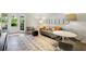 Living room with modern furnishings, light colored flooring, stylish decor and walkout access to the backyard at 2820 Andrews Nw Dr, Atlanta, GA 30305