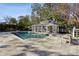 Backyard swimming pool featuring a nearby covered patio area plus lots of hardscape, landscaping and privacy at 2820 Andrews Nw Dr, Atlanta, GA 30305