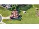 Aerial view of home showcasing a large, well-manicured lawn, a gazebo, and a deck at 3076 Harris Mill Ct, Duluth, GA 30096