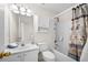 Bathroom featuring shower-tub combination, vanity, and neutral color palette at 3076 Harris Mill Ct, Duluth, GA 30096