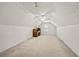 Large bonus room with ample space, carpet flooring, and a desk area at 3076 Harris Mill Ct, Duluth, GA 30096