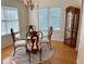 Dining room with ample natural light and decorative cabinet at 3076 Harris Mill Ct, Duluth, GA 30096