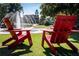 View of park with oversized adirondack chairs and a fountain at 3076 Harris Mill Ct, Duluth, GA 30096