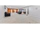 Unfinished basement featuring concrete flooring and a seating area at 407 Black Fox Dr, Locust Grove, GA 30248