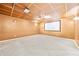 Home theater room featuring a projector, screen, and neutral-colored walls at 407 Black Fox Dr, Locust Grove, GA 30248