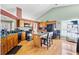 Well-equipped kitchen with modern appliances, an island, and wooden cabinets at 407 Black Fox Dr, Locust Grove, GA 30248