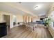 Spacious rec room with ping pong table, natural light, and adjacent full bathroom at 12600 Silver Fox Court, Roswell, GA 30075