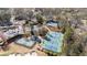 Overhead view of tennis courts and parking offers a recreational community and convenient access for residents at 12600 Silver Fox Court, Roswell, GA 30075