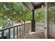 Relaxing outdoor balcony showcasing treetop views and a charming neighborhood setting at 215 Semel Nw Dr # 466, Atlanta, GA 30309