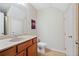 Bathroom vanity featuring tile floors, light cabinets, and plenty of storage at 215 Semel Nw Dr # 466, Atlanta, GA 30309