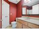 Cozy bathroom features a stylish vanity, toilet, and a mirror reflecting the shower and neutral-toned floors at 215 Semel Nw Dr # 466, Atlanta, GA 30309