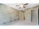 Neutral bedroom with carpet, a ceiling fan, and a decorative wall texture is ready for personal touches at 215 Semel Nw Dr # 466, Atlanta, GA 30309