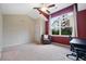 Bedroom features neutral carpet and a large window with a view of the neighborhood at 215 Semel Nw Dr # 466, Atlanta, GA 30309