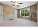Clean bedroom with neutral carpet, natural lighting, and a ceiling fan at 215 Semel Nw Dr # 466, Atlanta, GA 30309