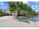 A row of townhouses with a community drive, featuring garages and lush trees for a peaceful neighborhood setting at 215 Semel Nw Dr # 466, Atlanta, GA 30309