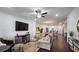 Spacious open-concept living area with hardwood floors, recessed lighting, and contemporary furnishings at 227 Atley Pl, Alpharetta, GA 30009