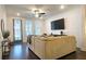 Bright living room with modern decor and large windows, offering ample natural light at 227 Atley Pl, Alpharetta, GA 30009