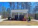 Community mail kiosk featuring individual mailboxes, landscaping and greenery at 227 Atley Pl, Alpharetta, GA 30009