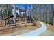 Walking trail featuring a swing bench and picnic table at 227 Atley Pl, Alpharetta, GA 30009