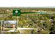 Scenic aerial view showcasing property's proximity to the prestigious East Lake Golf Club with lush trees and neighborhood overview at 576 Quillian Ave, Decatur, GA 30032