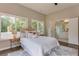 Serene main bedroom features neutral tones, ample natural light, and an en-suite bathroom for ultimate relaxation at 576 Quillian Ave, Decatur, GA 30032