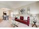 Inviting living room featuring modern decor, a comfortable couch, and open layout at 2580 Brittany Park Cv, Ellenwood, GA 30294