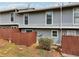 Fenced backyard of a townhome with a small grassy area at 4988 Meadow Ln, Marietta, GA 30068