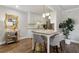 Open kitchen with a granite island and bar seating at 4988 Meadow Ln, Marietta, GA 30068