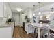 Modern kitchen with stainless steel appliances, granite countertops and a breakfast bar at 4988 Meadow Ln, Marietta, GA 30068